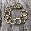 Matt gold T bar Bracelet with linked connecting circles – Jalen G