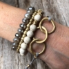 Set of four Bracelets with matt gold and natural howlite beads – Jenis