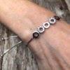 Silver adjustable Bracelet with five linked rings – Nerola