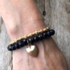 Set of two Bracelets – matt gold beads and navy blue with a heart charm – Yori B20-28